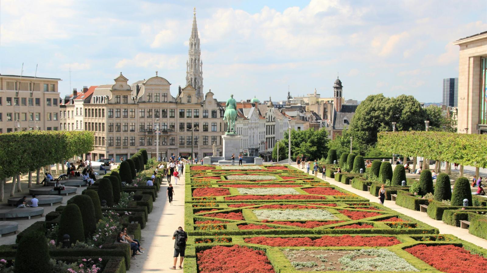 City scape of Brussels with a garden of flowers in foreground